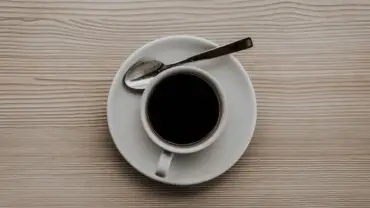Pouring coffee into a cup
