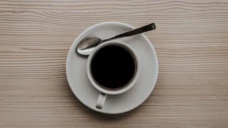 Pouring coffee into a cup