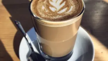 Signature latte with steamed milk